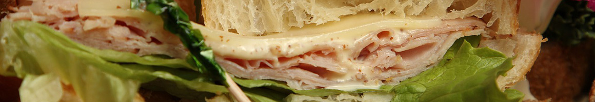 Eating Barbeque Sandwich at Schwind's Pork Store.